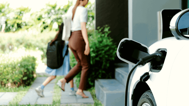 A new electric car being left to charge